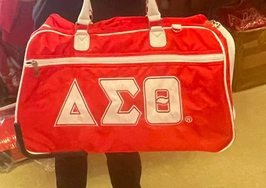 Large crimson Delta Sigma Theta weekender duffle with white trim