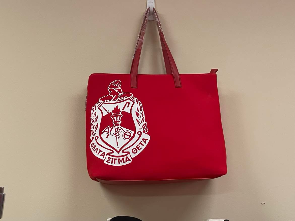 Red Delta Sigma Theta tote with large white crest and red handles