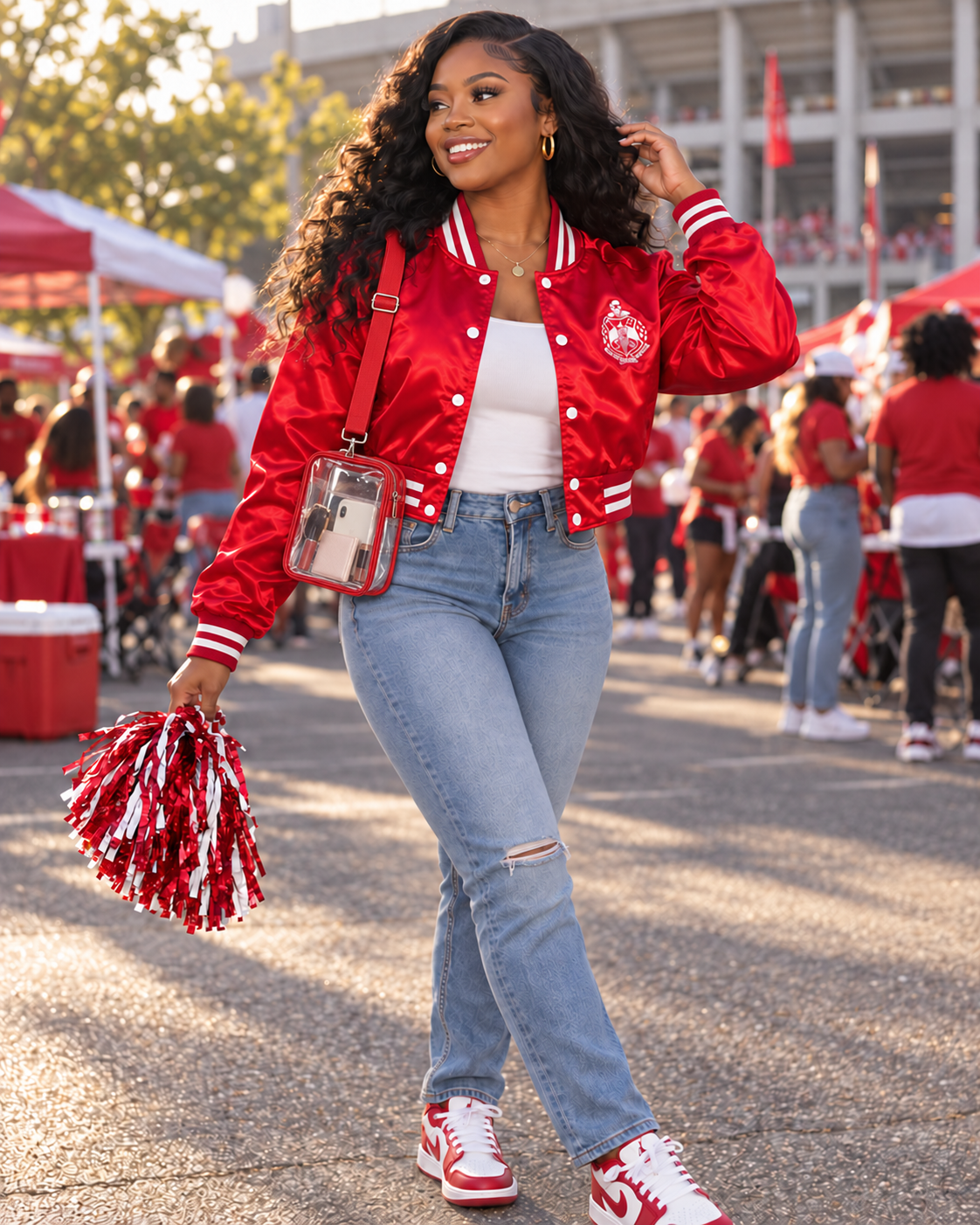Red cropped satin DST jacket with white stripes worn at a tailgate