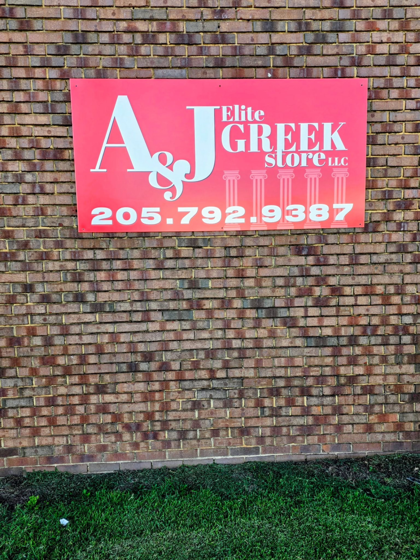 A & J Elite Greek Store sign on the Tuscaloosa storefront