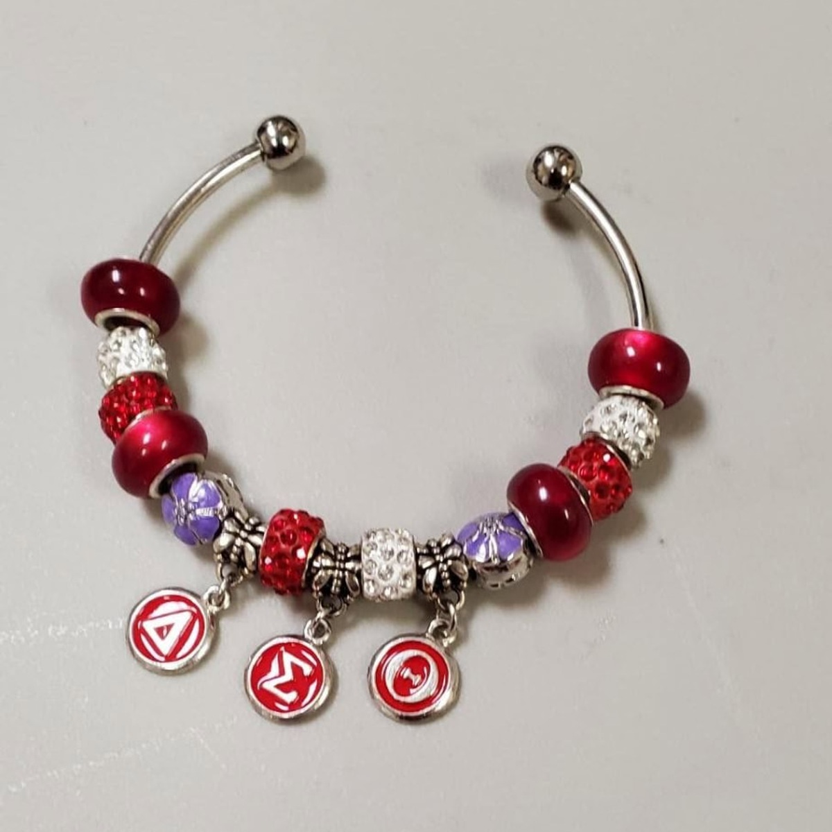 ΔΣΘ rhinestone beaded bracelet with crimson, crystal, violet beads and three Delta symbol charms
